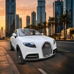 A white Gulf Buggy Mini BugsWagon electric car driving on a city road with tall buildings in the background.
