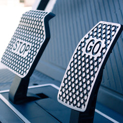 keon golf cart brake and accelerator pedal covers with 'STOP' and 'GO' labels.