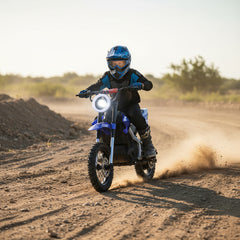 Child riding a dirt bike on a dirt track