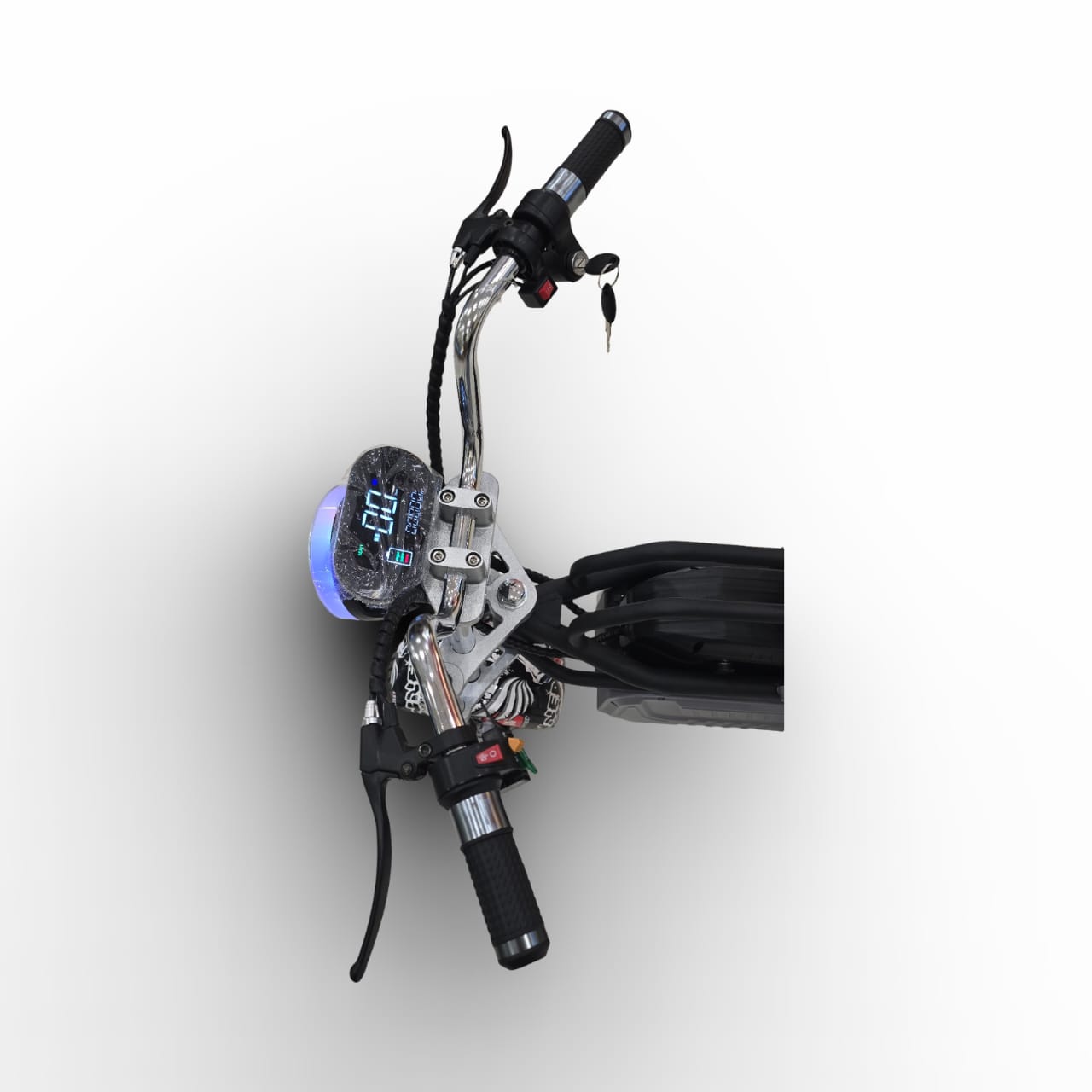 Close-up of a motorcycle handlebar with control panel