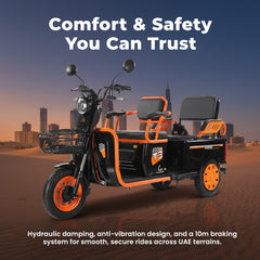 Kugoo Electric tricycle with orange accents on a desert