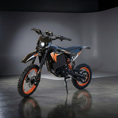 Motorcycle with orange accents on a reflective surface