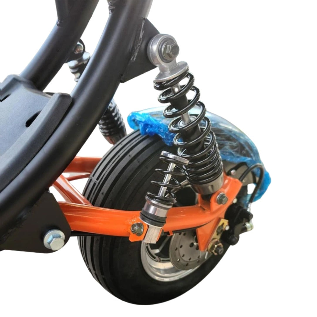 Kugoo suspension system with an orange frame and black tire.