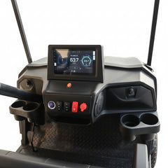 Close-up of a golf cart dashboard with a digital display and control buttons