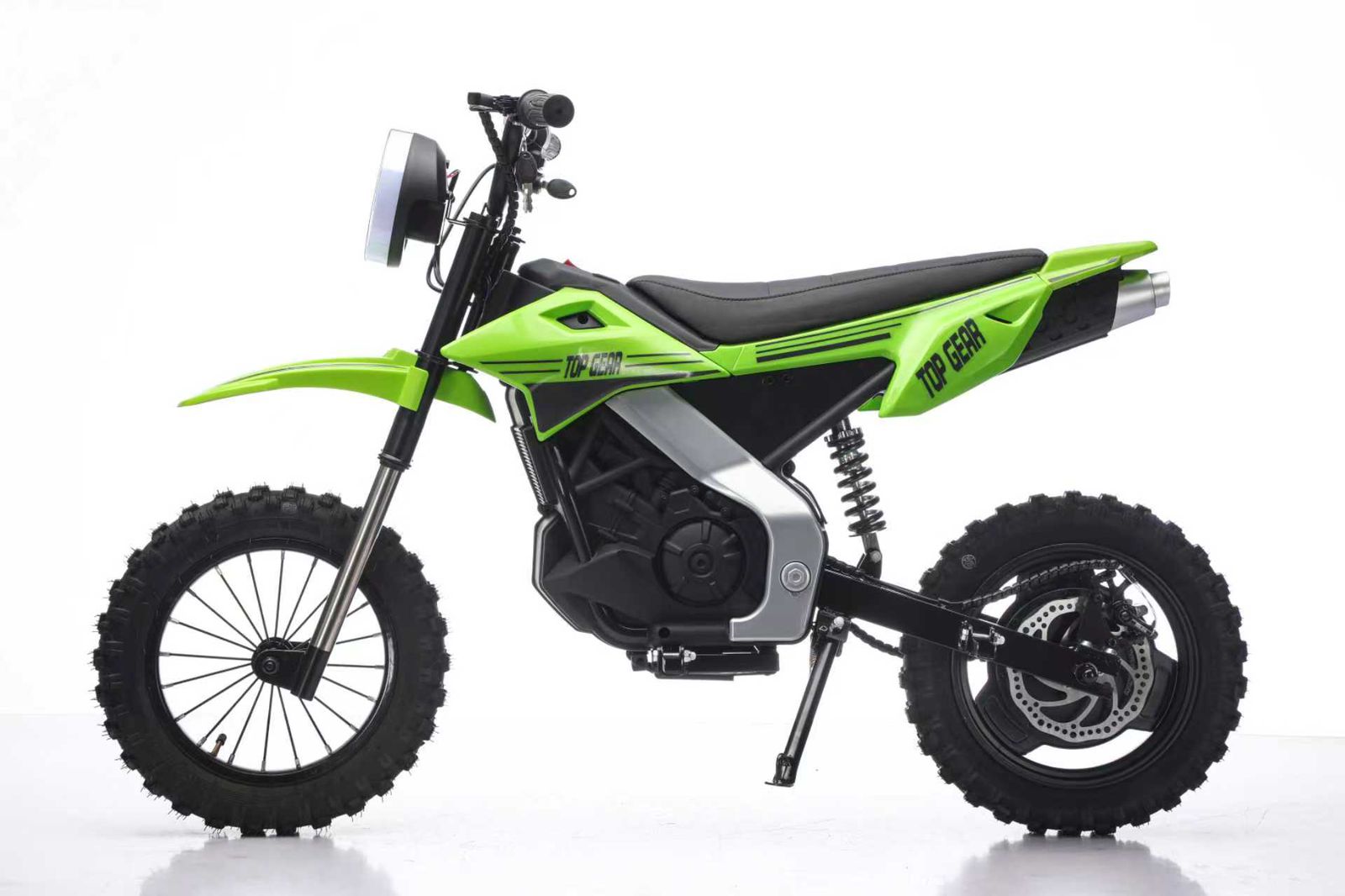 Side View of a Green dirt bike with a black seat