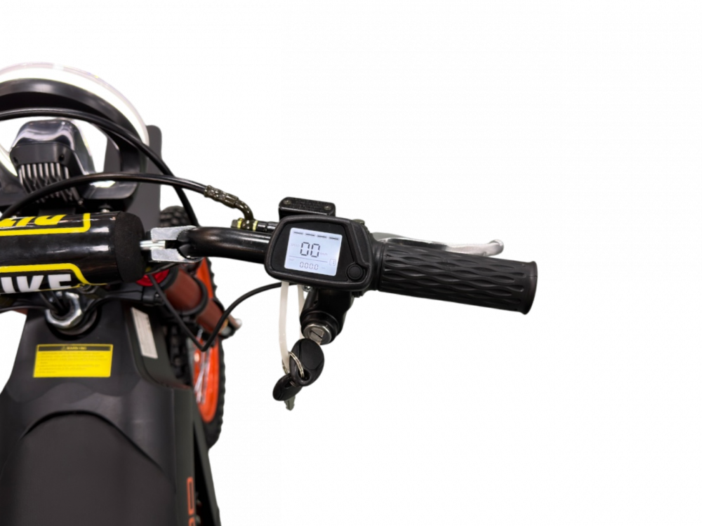 Close-up of a motorcycle handlebar with a control panel