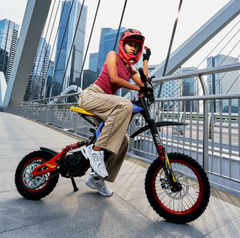  a girl sitting on Titaone Viper S Electric Dirt Bike High Performance 