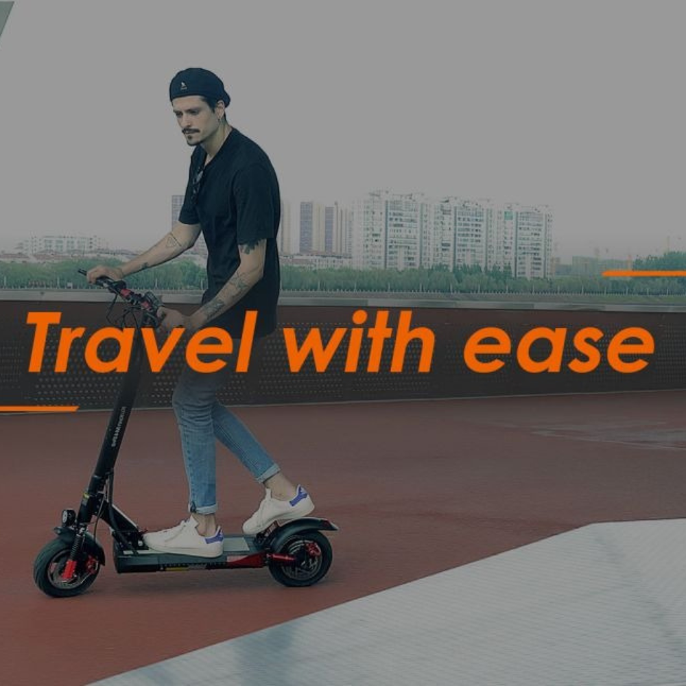 Man riding an electric scooter with 'Travel with ease'