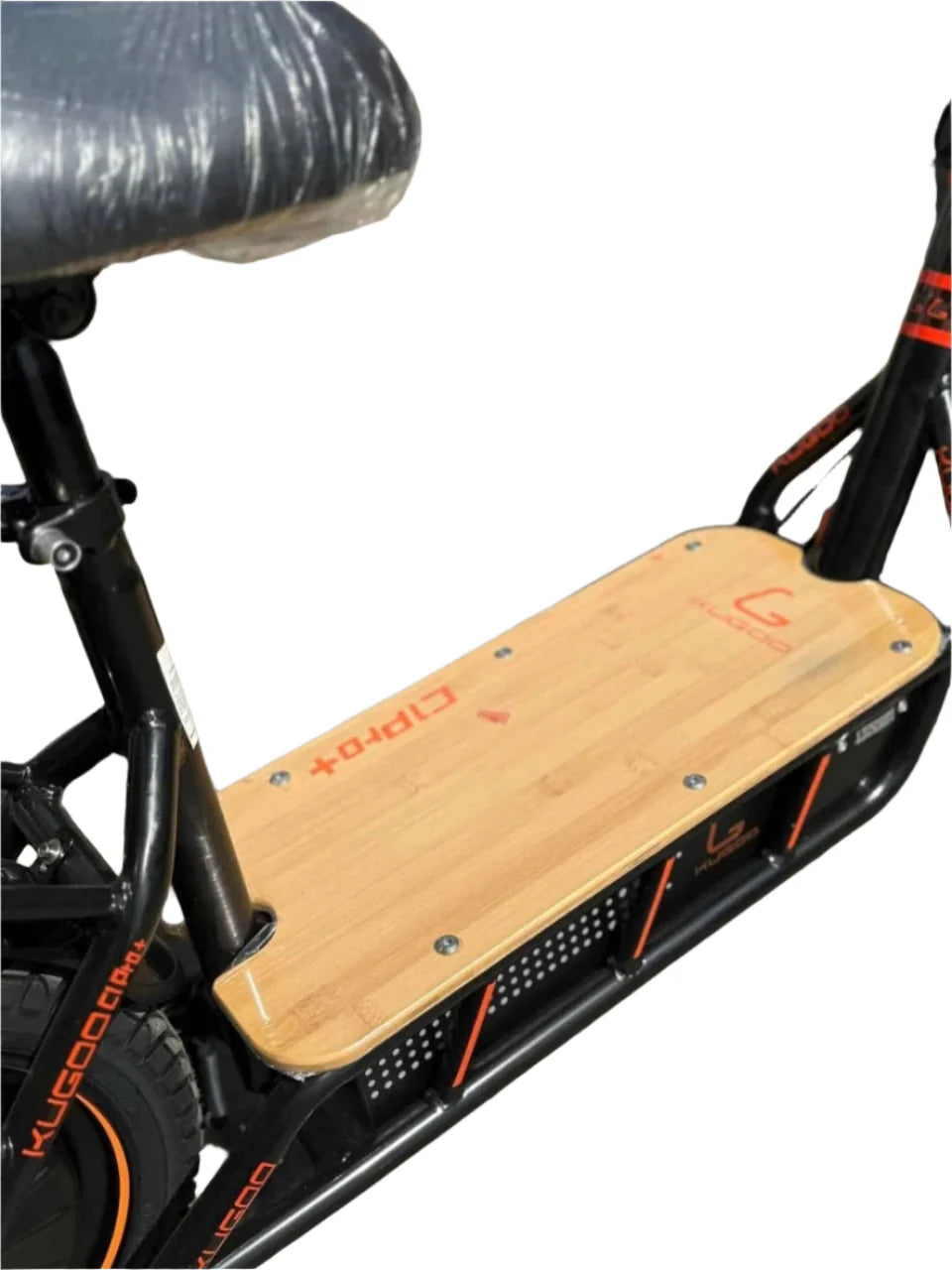 Close-up of a scooter with a wooden deck