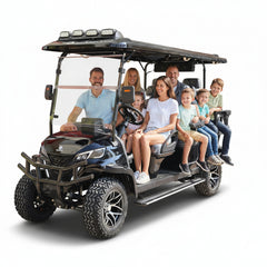 Family of six sitting in a large black off-road vehicle