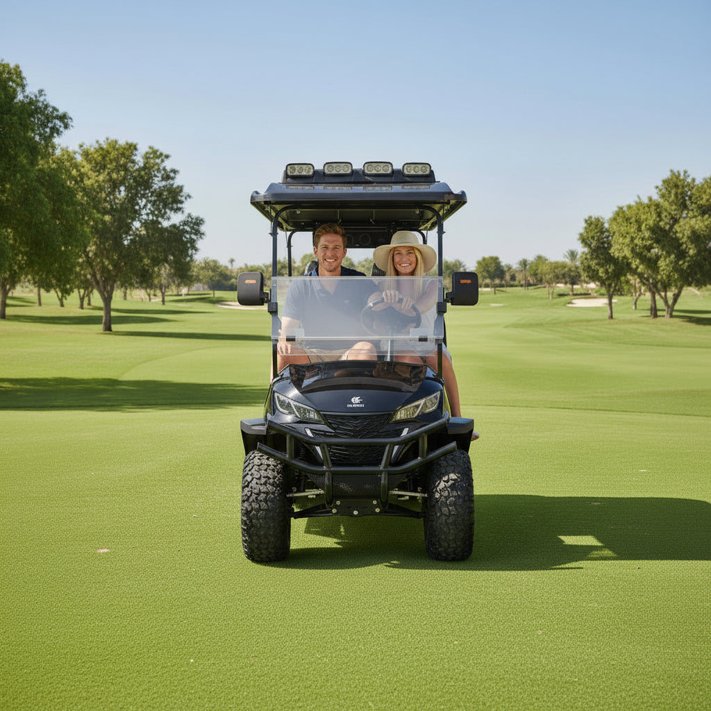 Two people in a golf cart on a golf course with trees