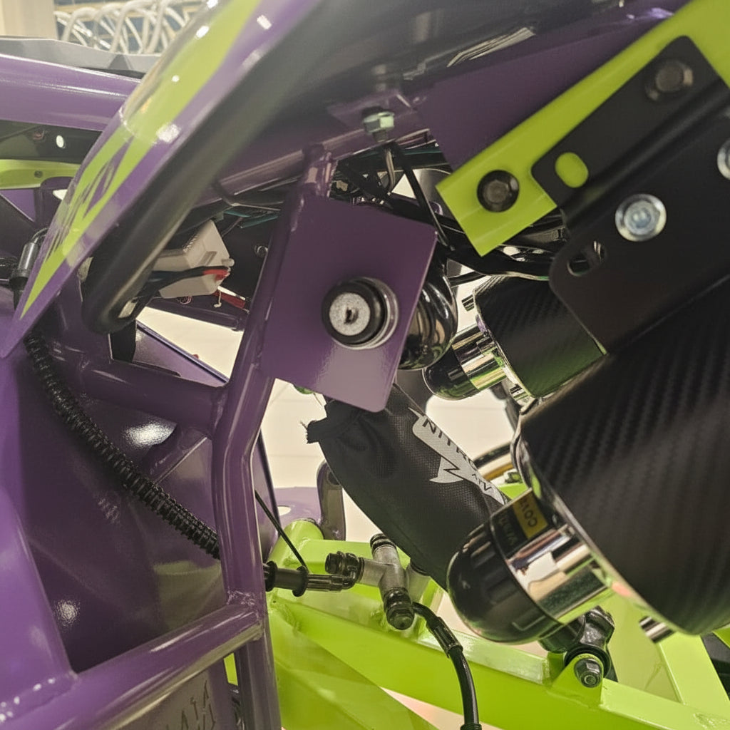 Close-up of a purple and green mechanical object with intricate details