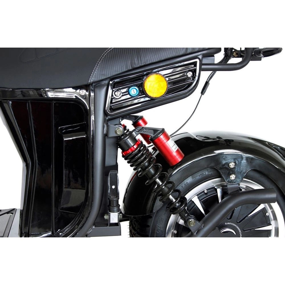 Close-up of a motorcycle's suspension and wheel